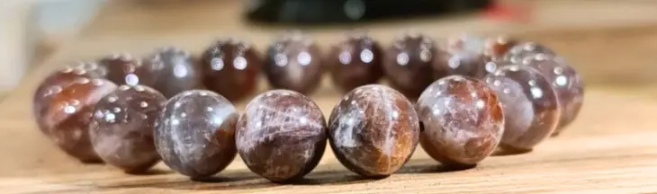 Bracelet Pierre de Soleil Noire Orangée 10mm